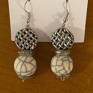 Silver and cream earrings